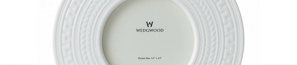 wedgwood white intaglio design plate on white background