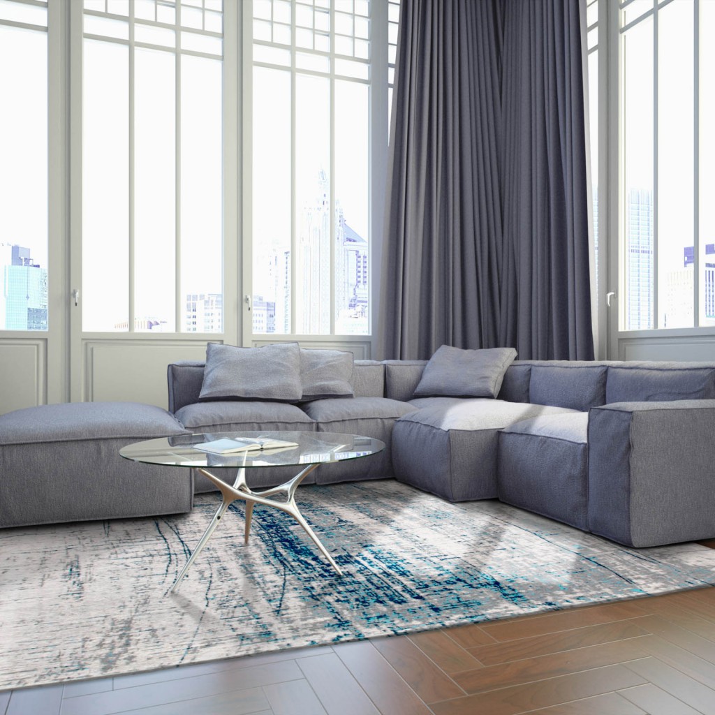 rug care guide - rug in a open living room with sunlight shining through the windows
