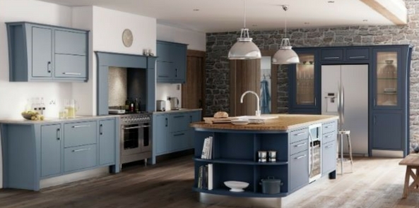 colour trend for 2017 denim blue kitchen with brick walls and grey wooden floors and a white ceiling