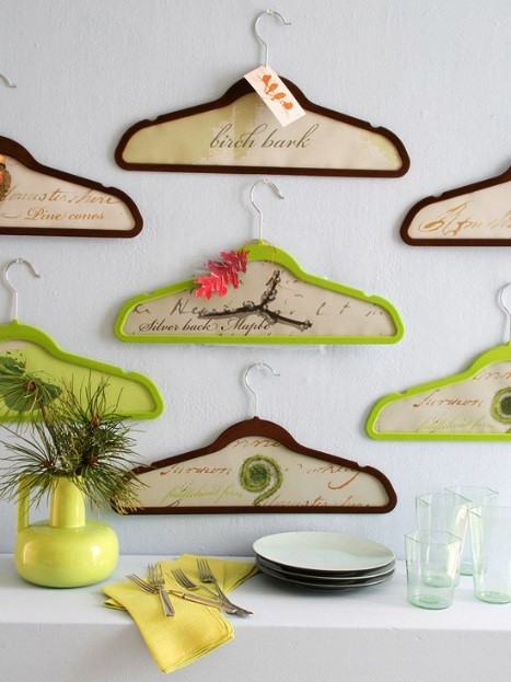 Upcycle clothes hangers filled with wallpaper