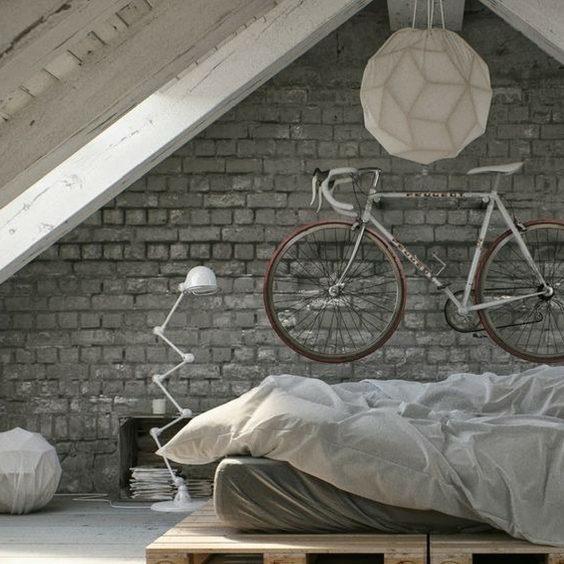 concrete hipster home decor with bicycle feature on the wall in a bedroom