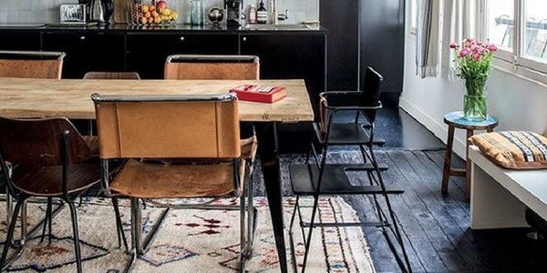 a rustic kitchen with best kitchen rugs traditional rug under the wooden table in front of a dark coloured kitchen
