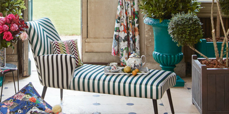 stripes trend armchair in a botanical room