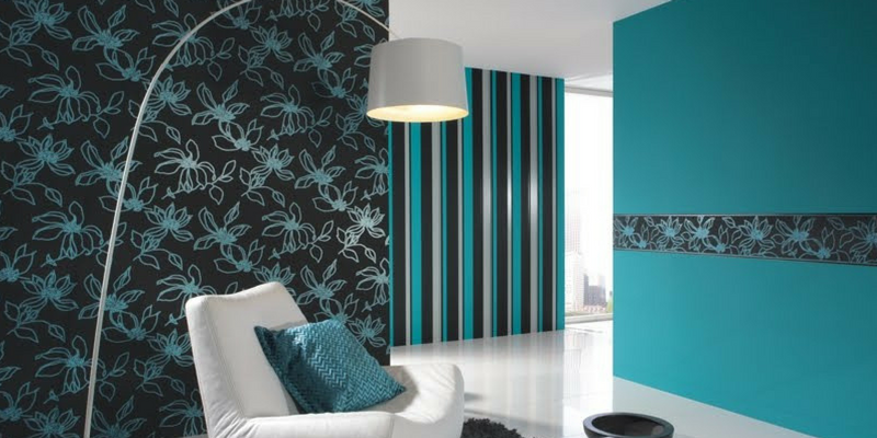 stripes trend a teal coloured living room with patterned and striped walls
