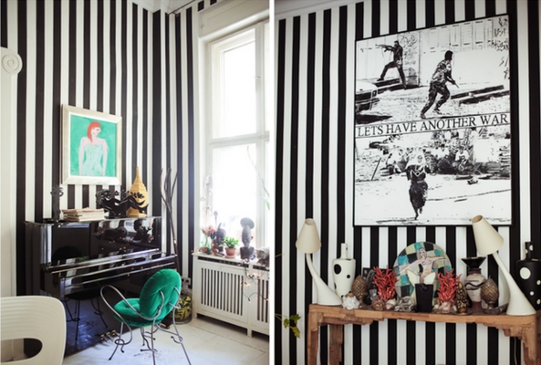 a small space with black and white striped walls to make it seem bigger