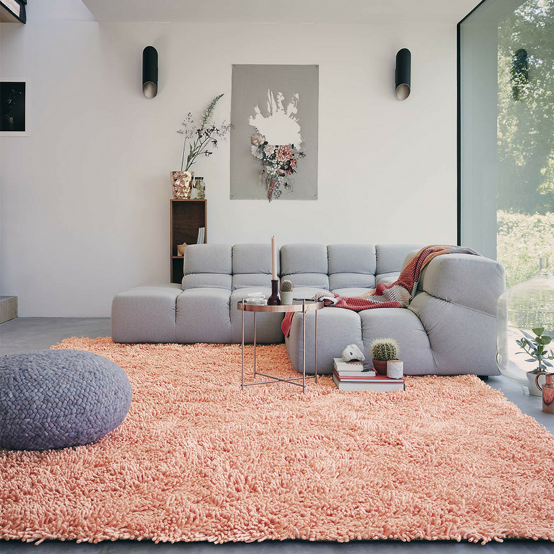 blush pink shaggy rug in a plain style living room