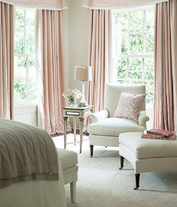 blush pink living room with long drapes curtains