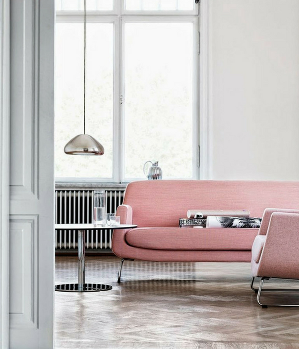 blush pink living room with a pink sofa