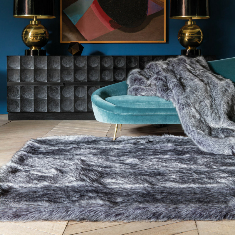 games of thrones style liviing room with faux fur rugs and throws from the rug seller