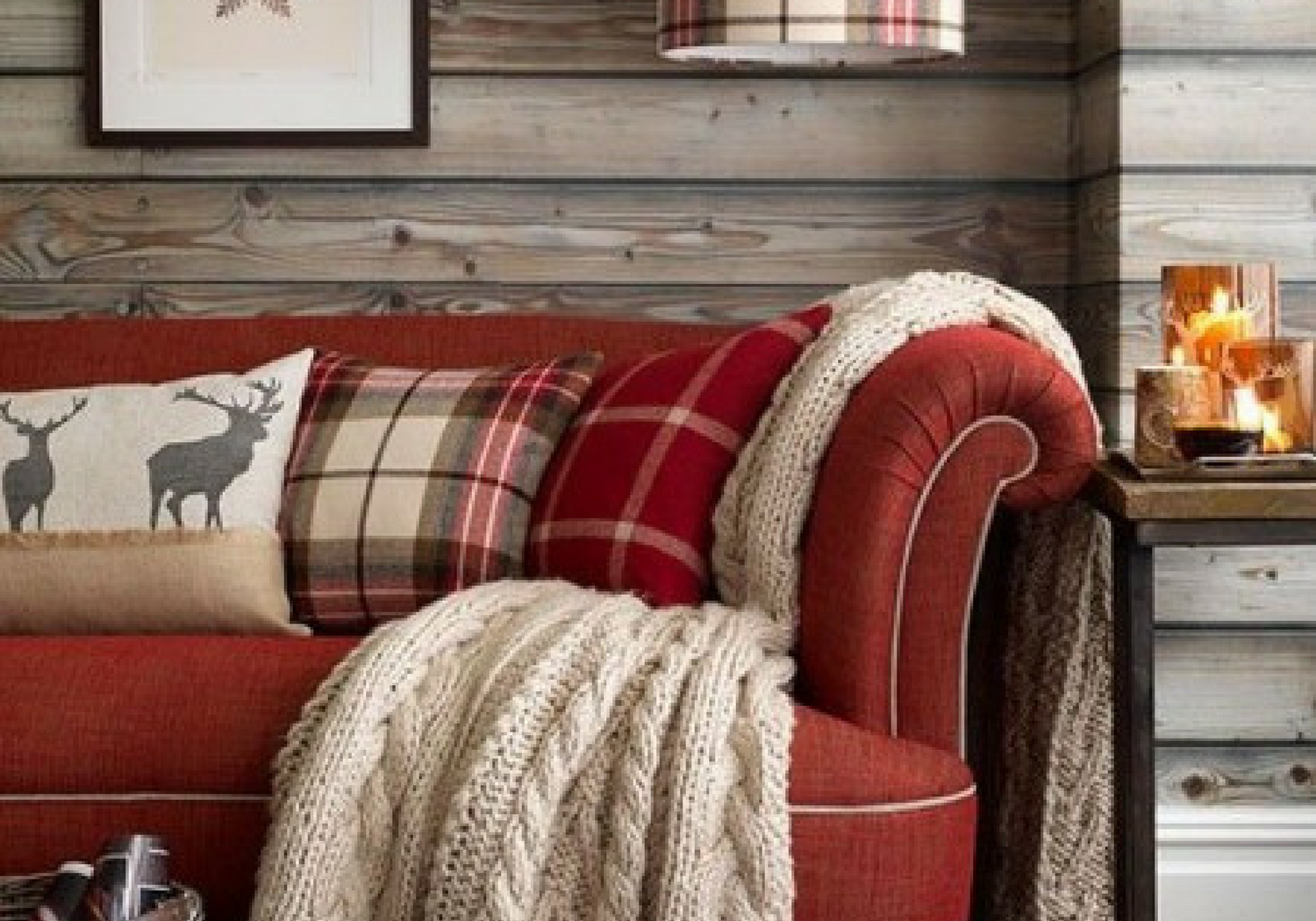 red living room couch with tartan plaid cushions