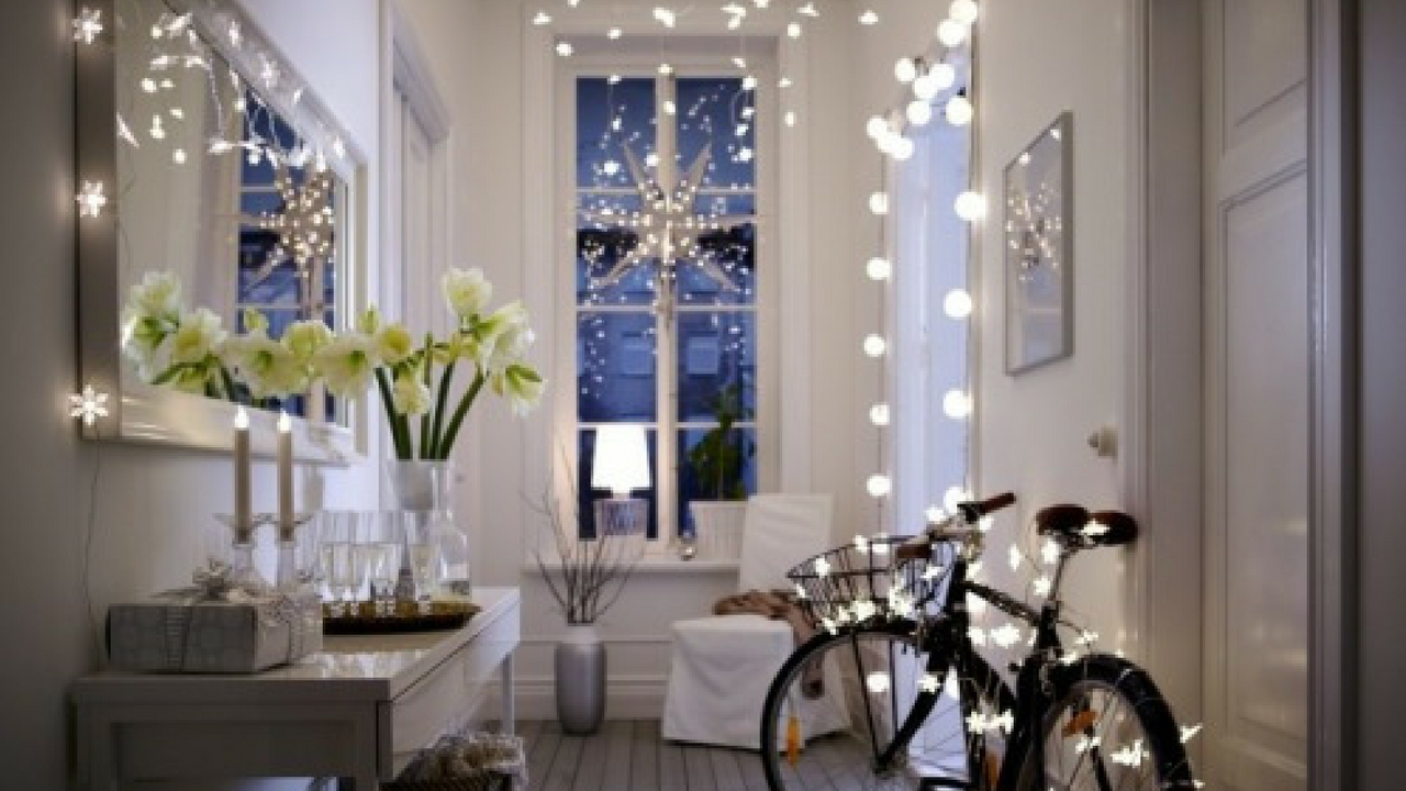 christmas fairy lights in a white open space home