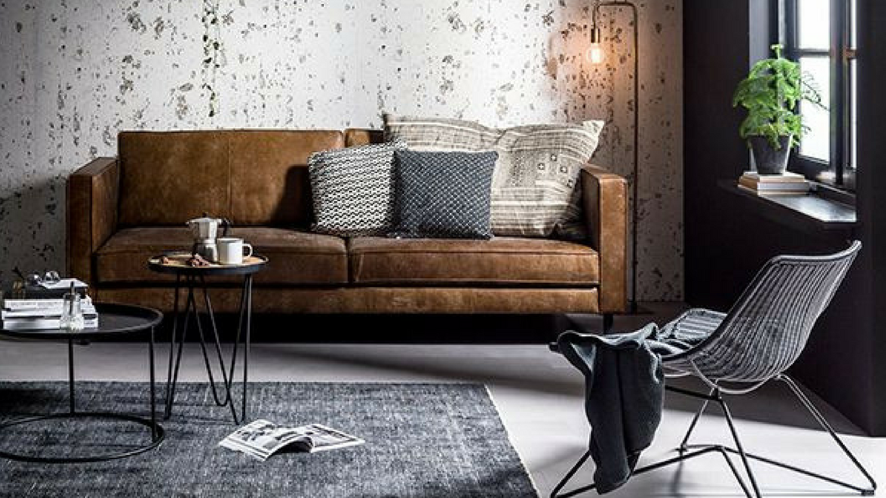 dark colours industrial inspired living room with dark grey furniture accents