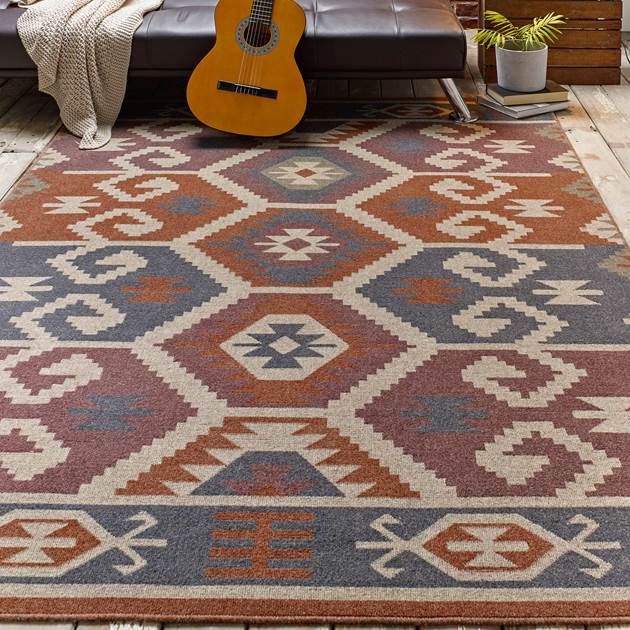 kilim rug with guitar on it