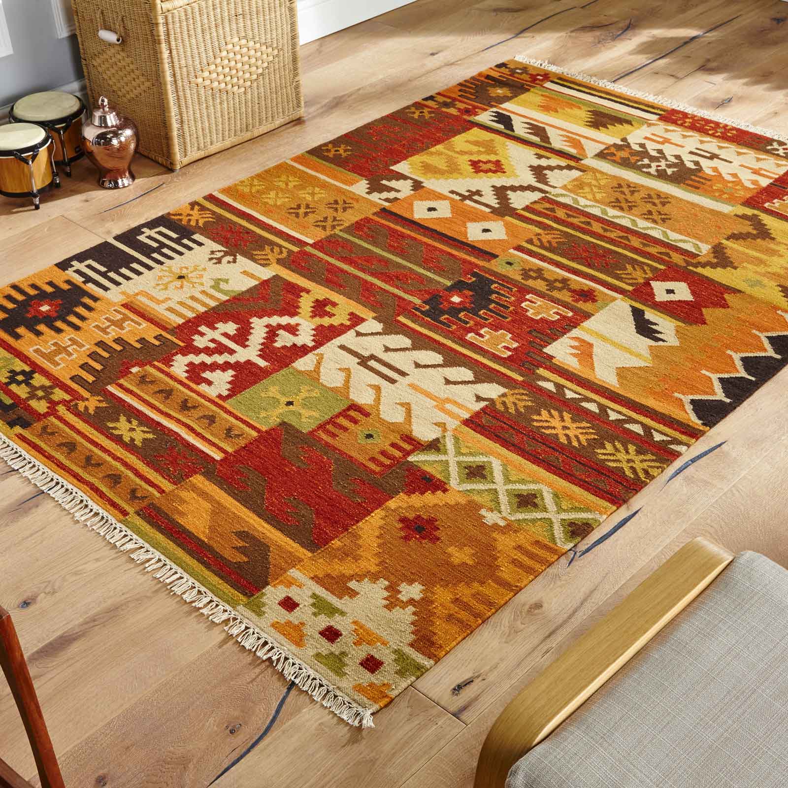 kilim rug on wooden flooring with chair on frame of image the rug seller
