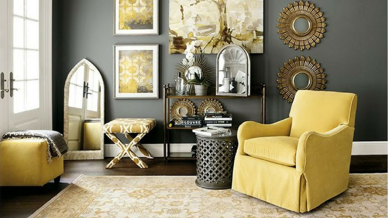 Yellow living room with a large sofa and accents