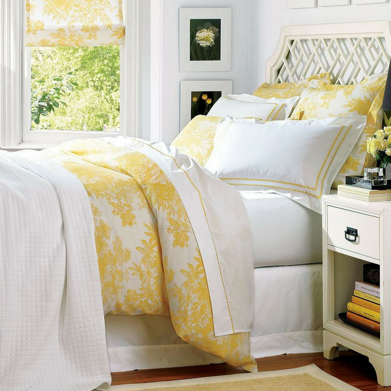 Yellow and white sophisticated and stylish bedroom decor