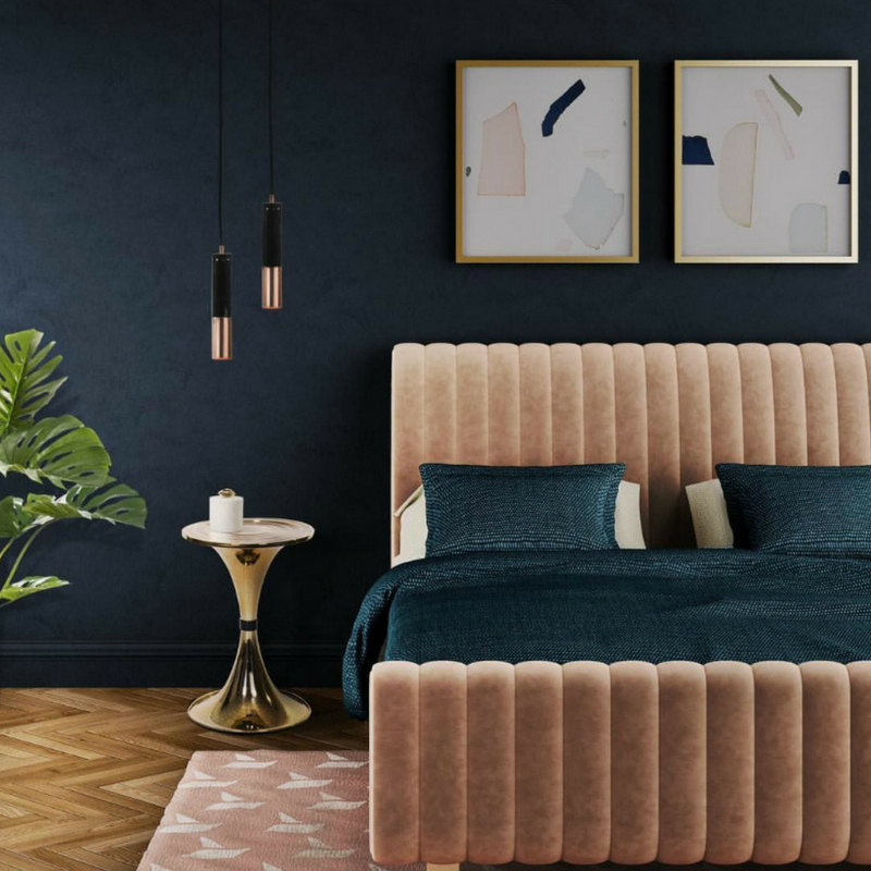 Interior Design Trends Velvet Bed in a dark room
