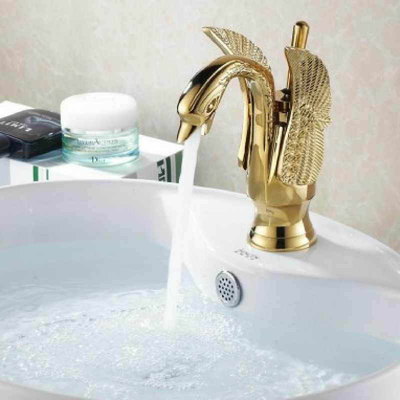 Interior Design Trends brass taps shaped like a swan