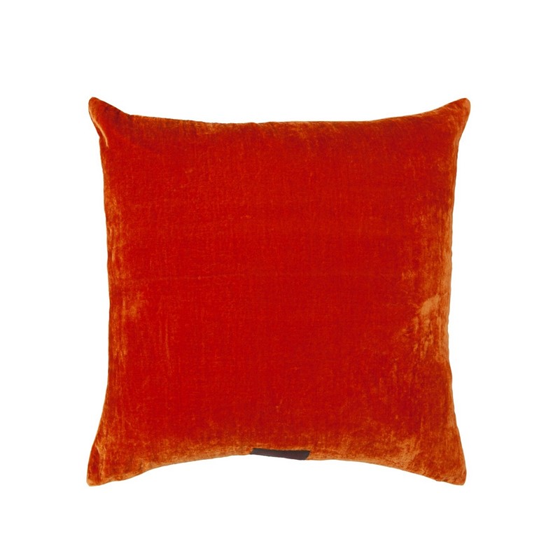 bright orange velvet paddy cushion in cut out background as luxury accessory