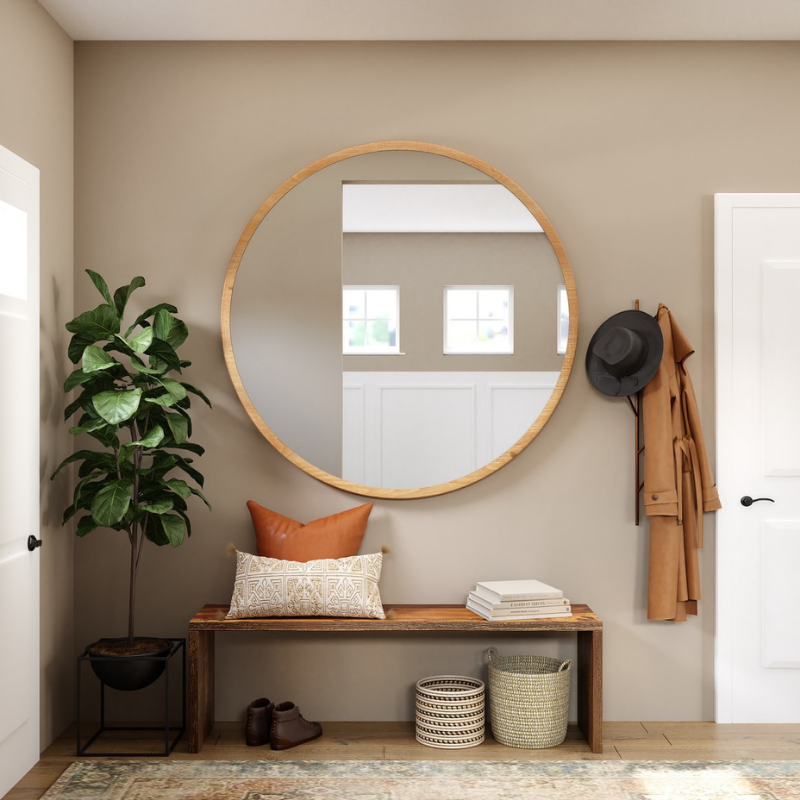a small porch using a large mirror to extend a small space