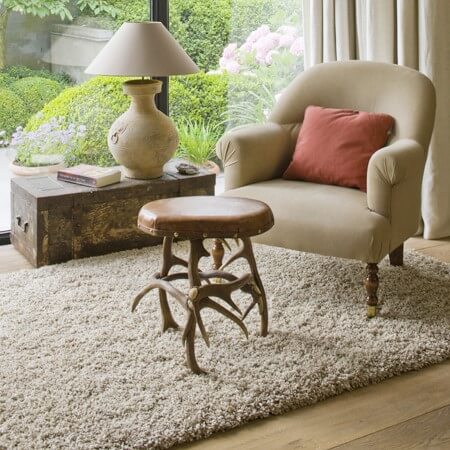 a rug in a small room to cosy up and to decorate small spaces
