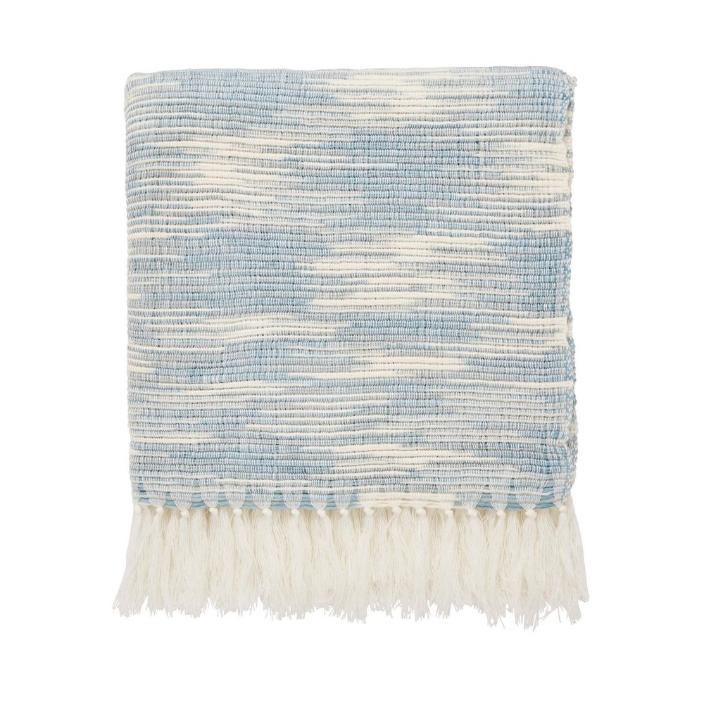 a cut out image of a neroli throw in blue and white to cosy up your bedroom