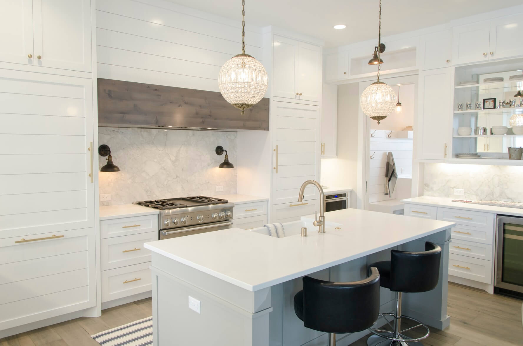 statement lighting in a clean kitchen for interior trends for 2022