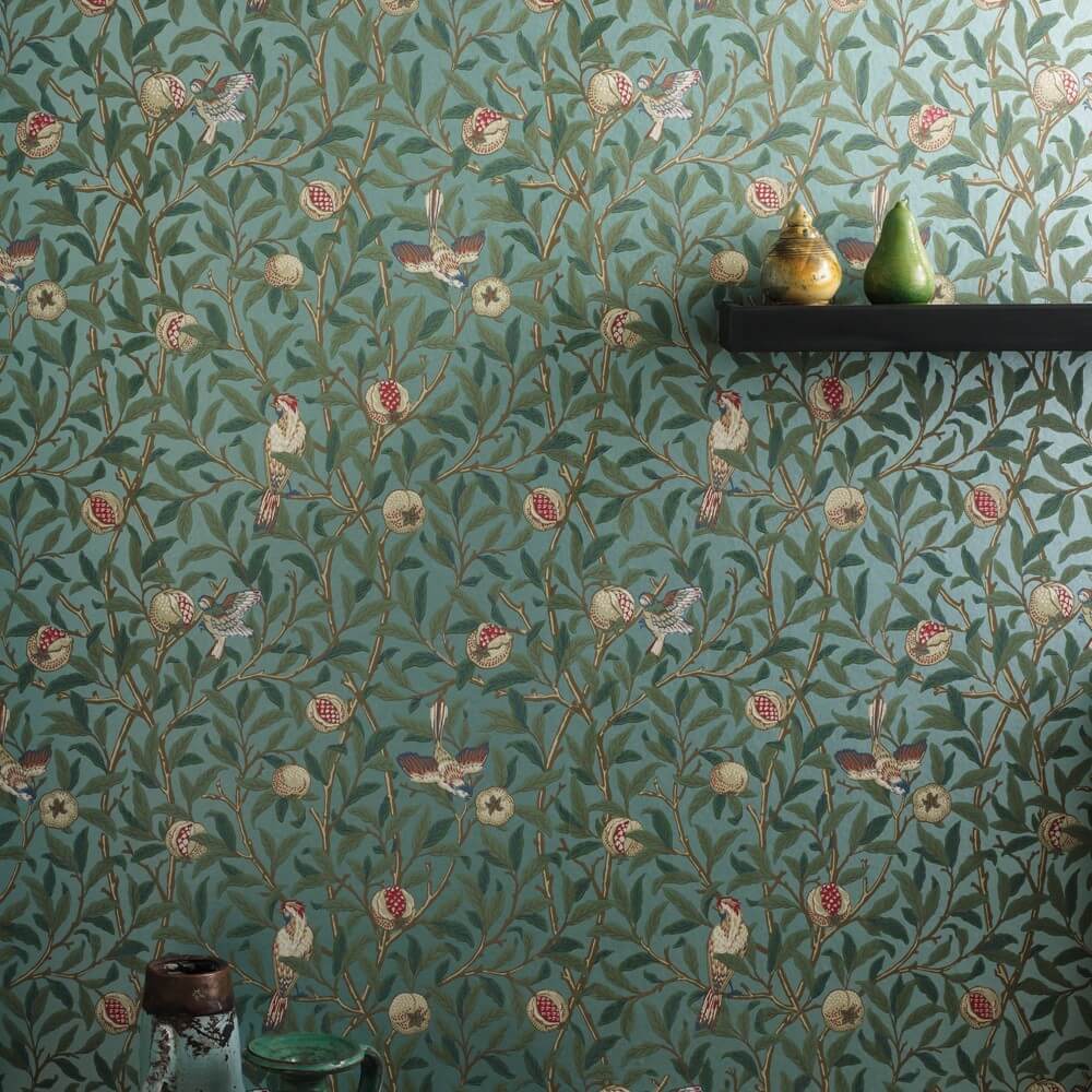 a patterned wallpaper by morris and co featuring pomegrantes 