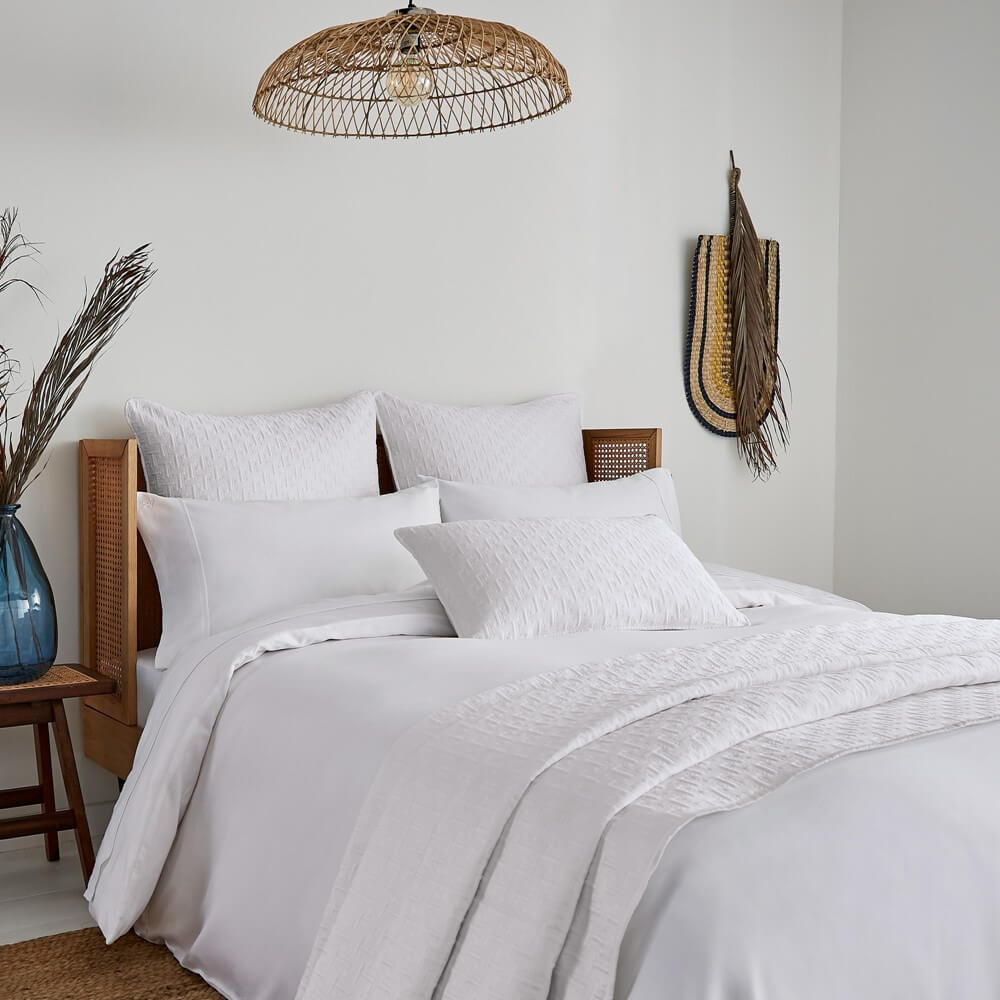 ted baker plain white bedding in a clean and bright bedroom
