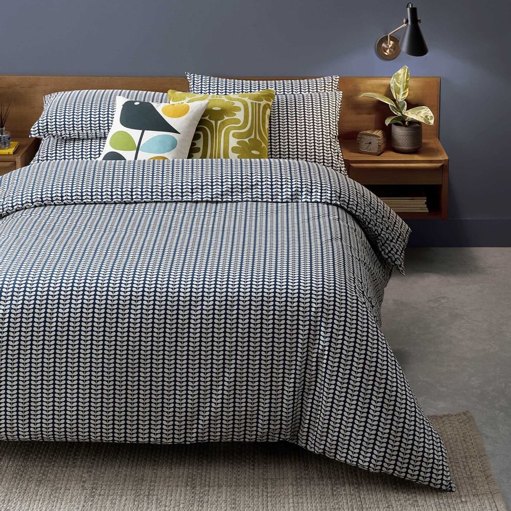 Orla Kiely whale blue bedding in a minimal bedroom