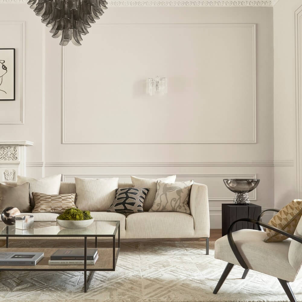 A pale lounge space with white walls