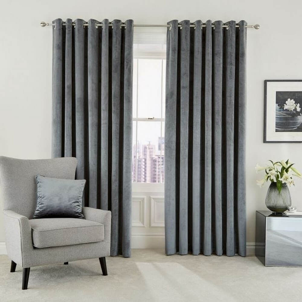 Dark grey lined curtains in a living room space